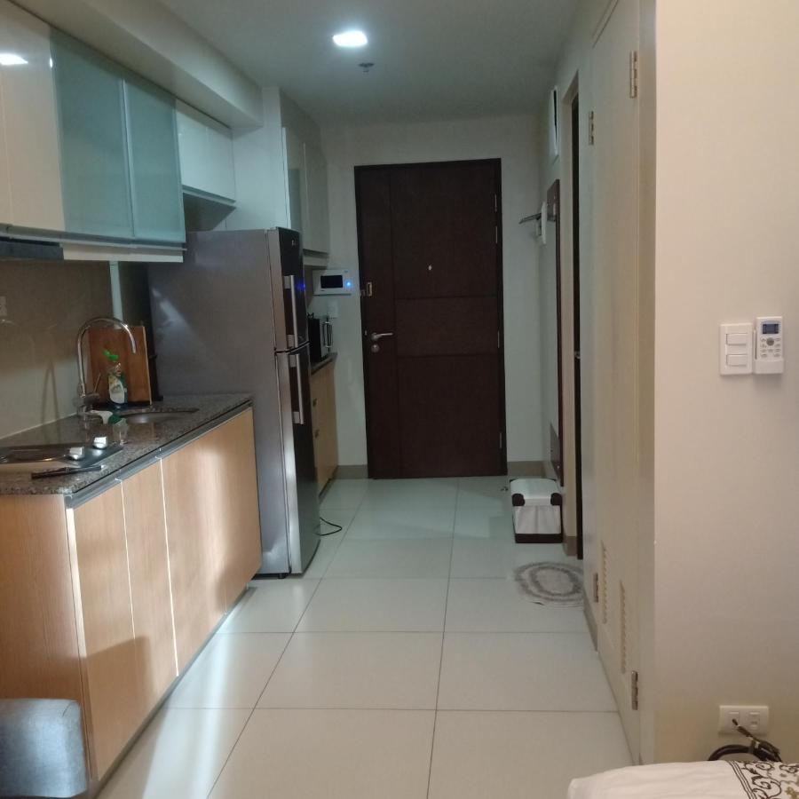 One Uptown Opposite Of Grandhyatt Hotel Manila Taguig City מראה חיצוני תמונה